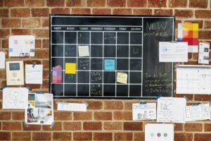 Project planner on brick wall